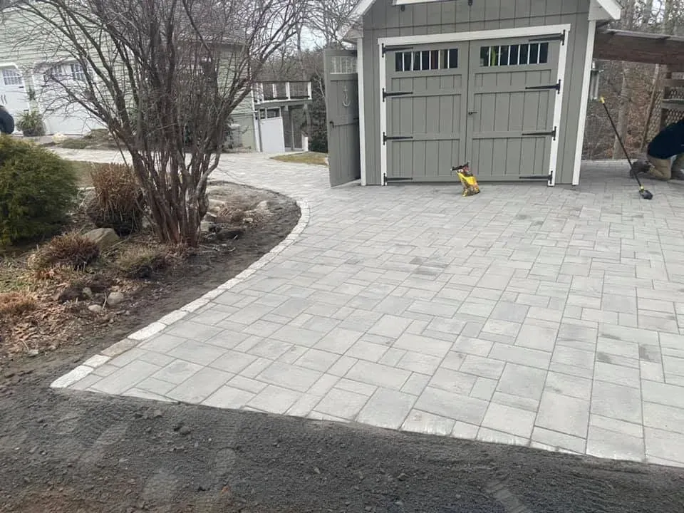Finished paver driveway and walkway at a residential garage