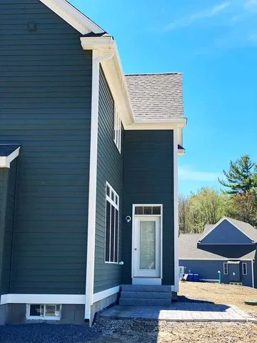 Side view of blue green house