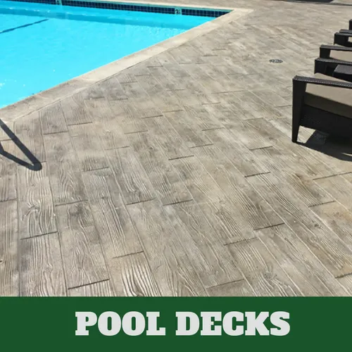 Milford stamped concrete pool surround with a wood grain finish.