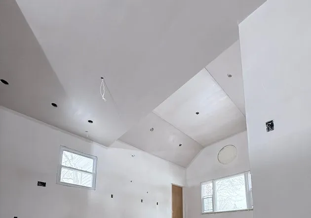 finished room with smooth plastered walls