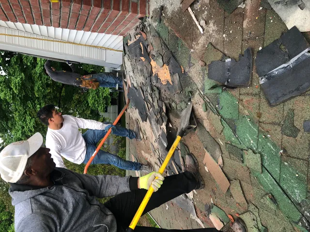 work photo from newroofingandsiding.com