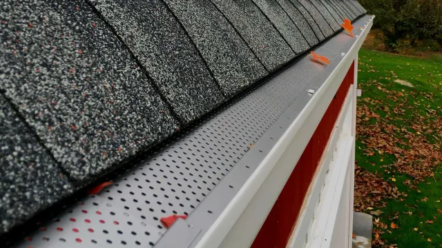 Red building with gutter guards