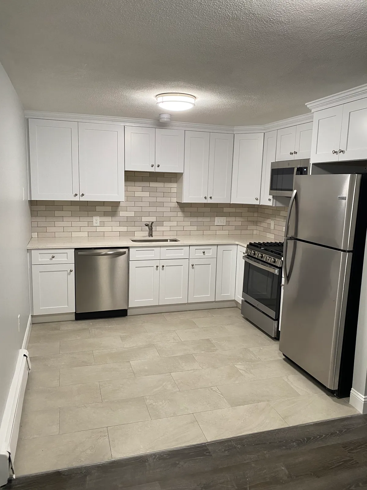 Kitchen remodel with tile backsplash
