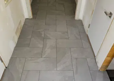 Hallway & Laundry Room Tile Installation – Holly Hill, Westport, MA