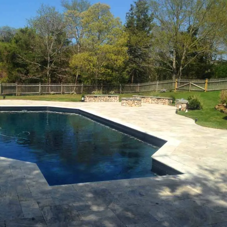 Pool renovation with outdoor firepit and new hardscaping