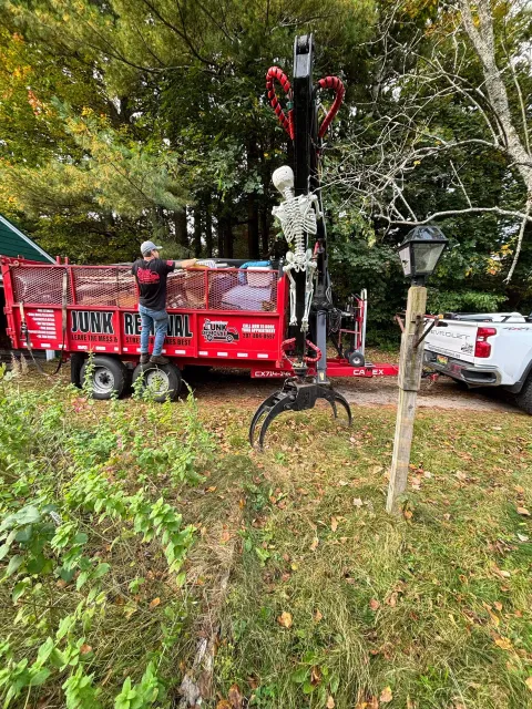 Finally Freedom Junk Removal's crane in action