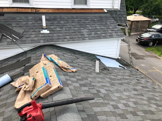 work photo from newroofingandsiding.com