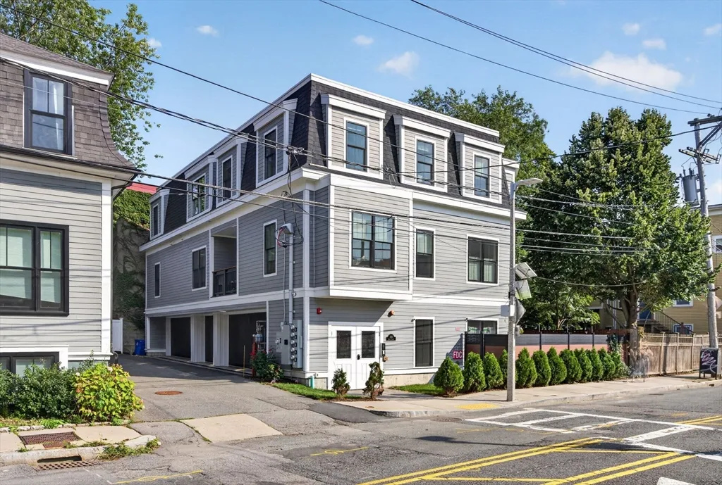 Welcome to 266 Amory Street, a sun-drenched 2-bed, 2-bath corner unit in a boutique Jamaica Plain building completed in 2022. Oversized windows bring in great natural light and look out into the trees, giving the home a bright, private feel. The kitchen features Calacatta Sponda quartz countertops, Bosch appliances, and wide-plank hardwood floors throughout. Both bedrooms are generously sized, with two full baths and in-unit laundry. One of the biggest highlights is the large garage parking space already fitted for EV charging, a rare amenity in JP and a major convenience for city living. And as they say in real estate: location, location, location. Directly across from the Southwest Corridor Park and just half a block from Stony Brook Station, with Ula Cafe, Sam Adams Brewery, and some of JP’s best restaurants and neighborhood spots nearby. Newer construction, great light, garage parking with EV capability, and one of the most convenient locations in JP.