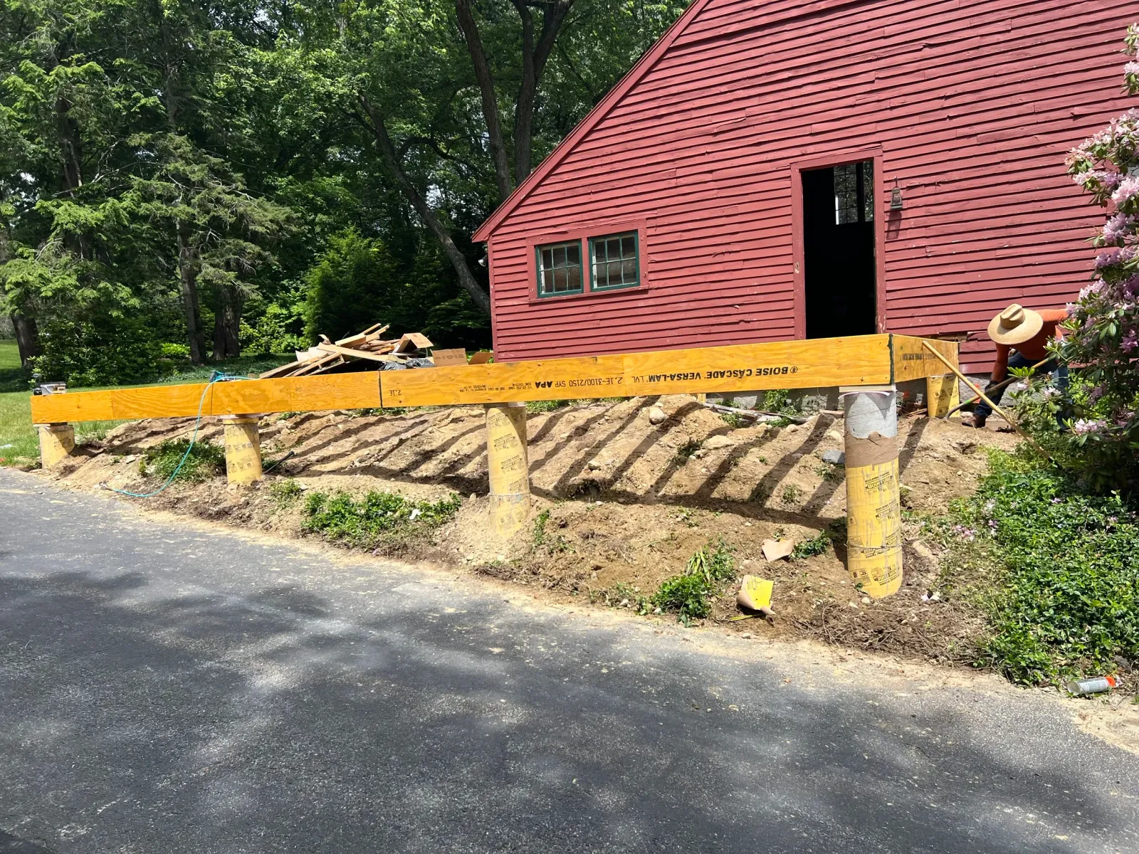 Addition/deck framing at an antique red colonial