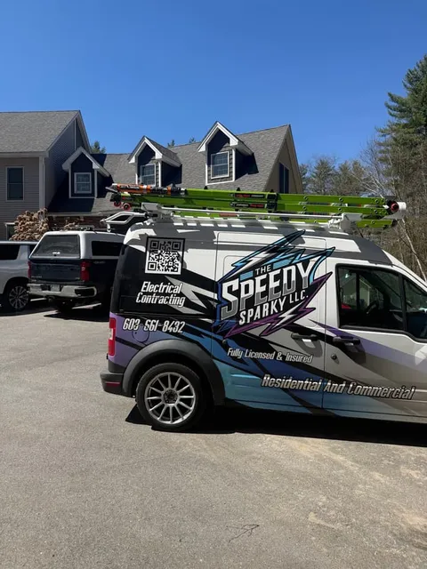 Ladders racked and the van staged in the driveway ahead of a full-day install.
