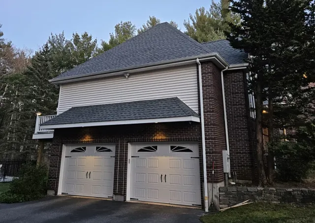 Winter Hill Roofing crew completing a residential project