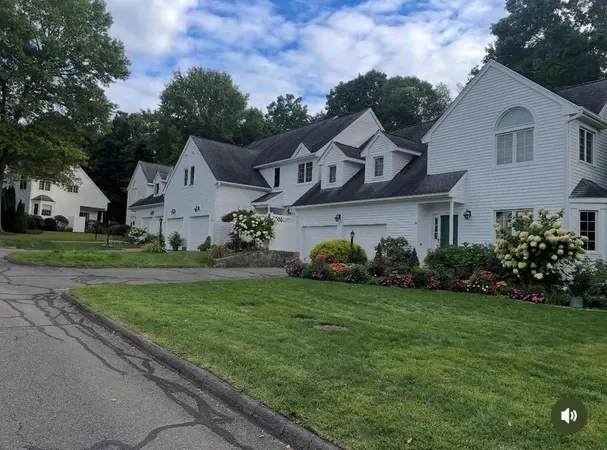 White houses on a suburban street for home renovations.