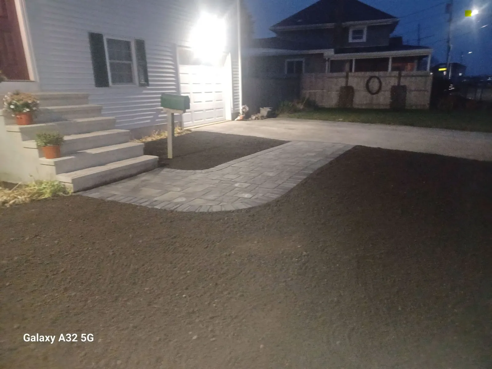 After: Stone walkway and steps at front of home