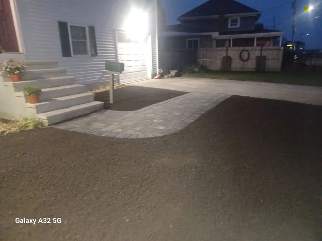 After: Stone walkway and steps at front of home