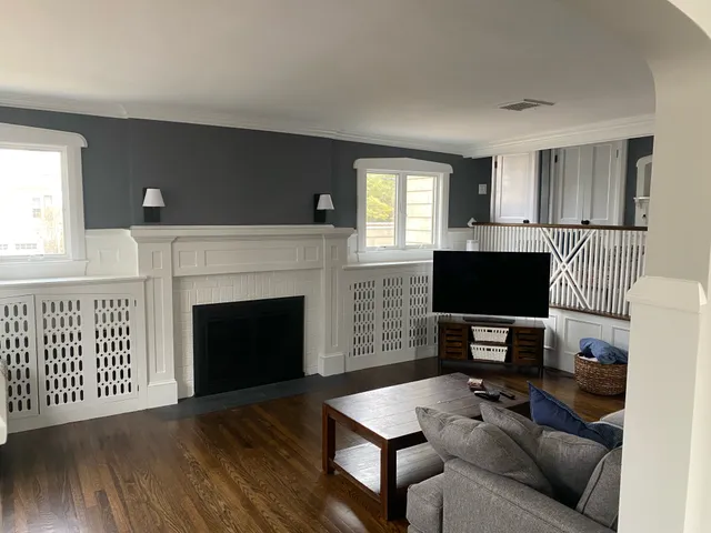 Finished living room with fireplace millwork