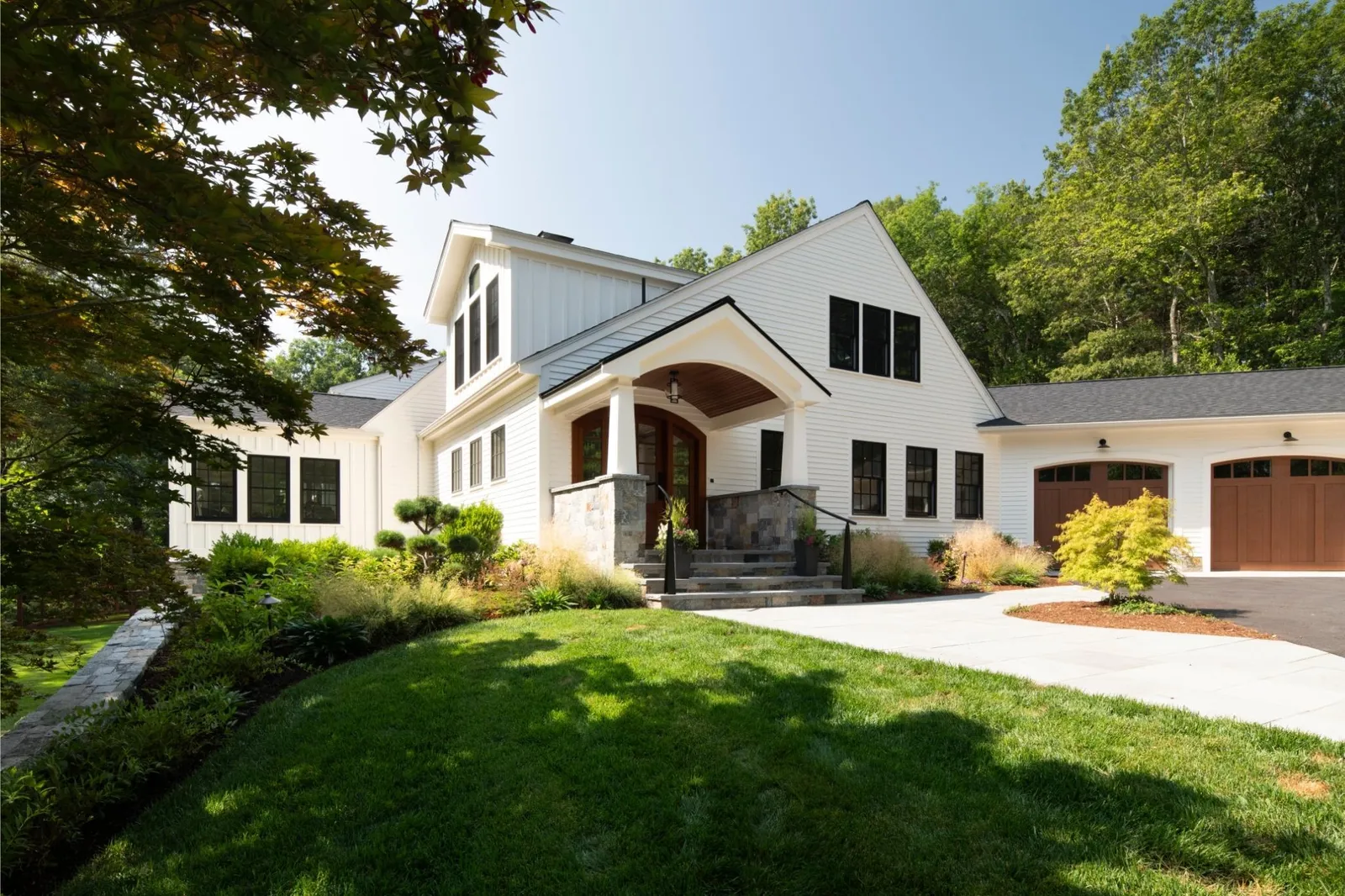 Black and white modern farmhouse renovation in acton, massachusetts