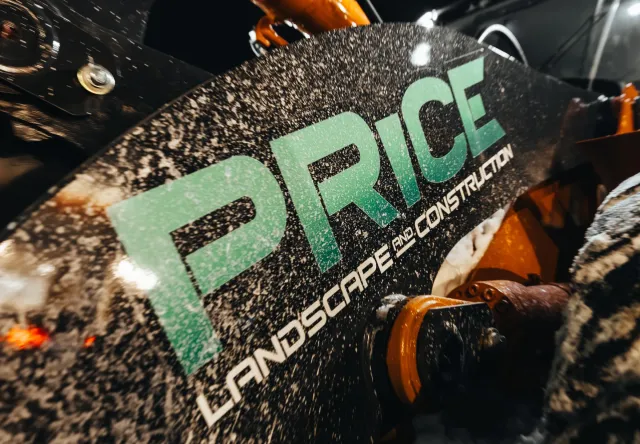 Price Landscape and Construction close up of logo on a loader machine