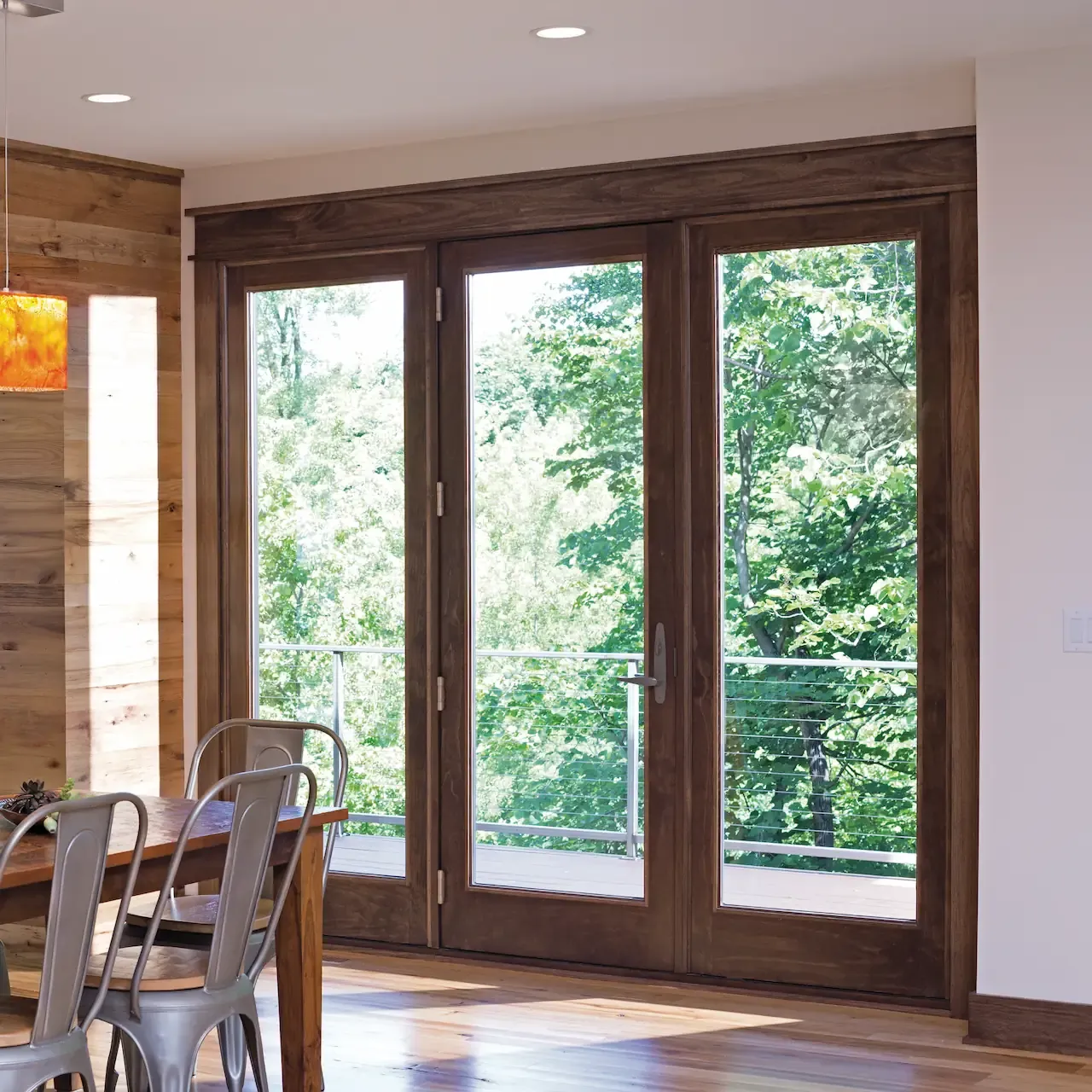 A renovated patio door on a beige house