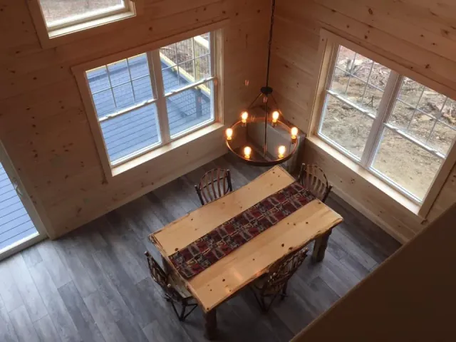 Dining Room With Table And Hanging Light