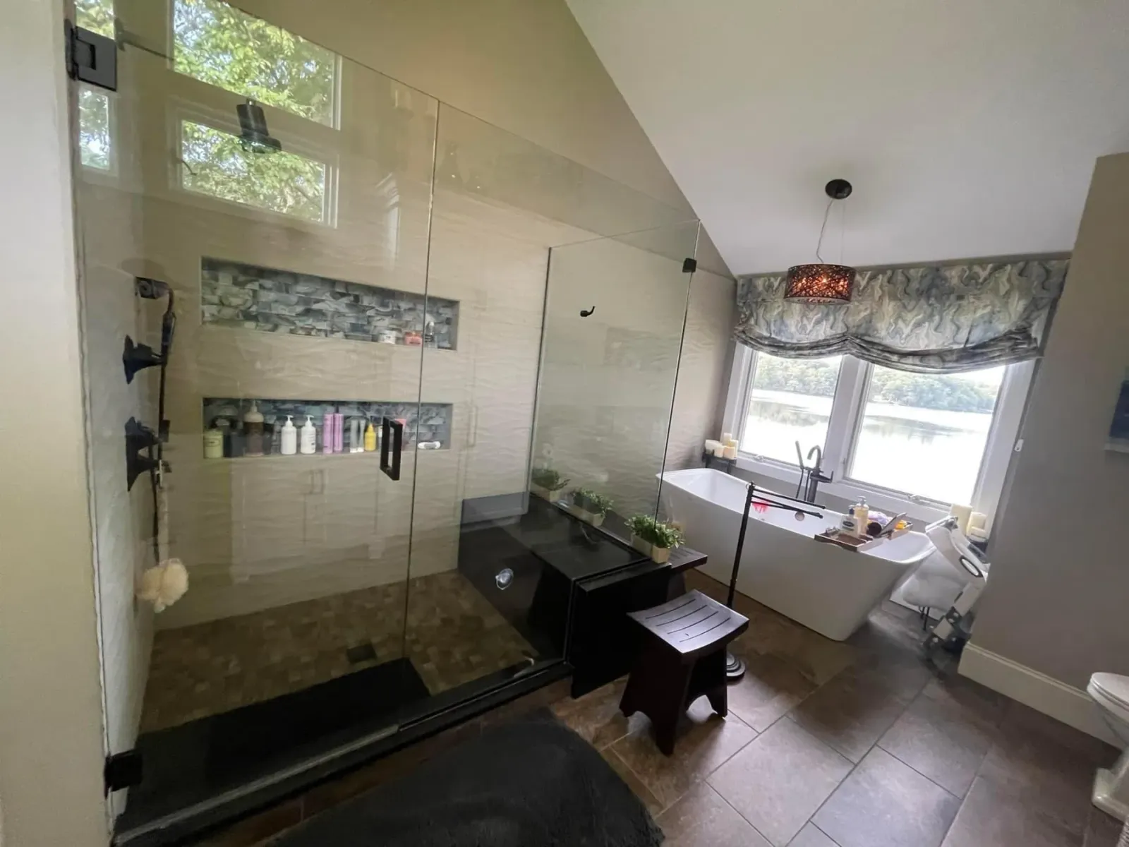Glass shower and soaking tub after cleaning