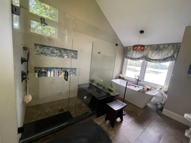 Glass shower and soaking tub after cleaning