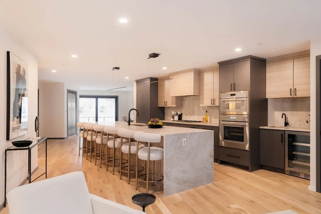 Luxury kitchen with custom quartzite countertops installed by Stone Concepts