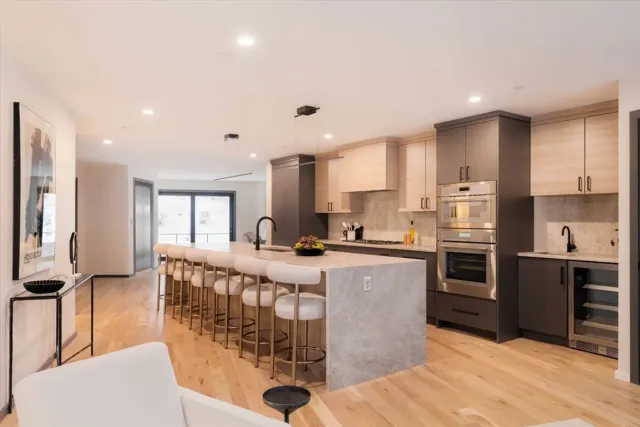 Luxury kitchen with custom quartzite countertops installed by Stone Concepts