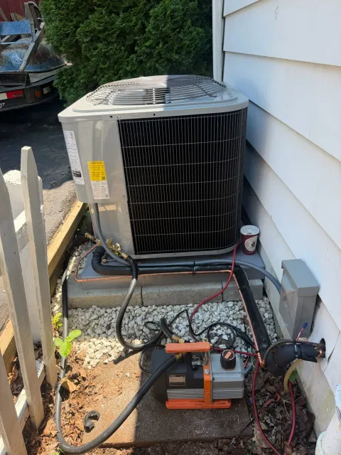 Residential air conditioning condenser installation