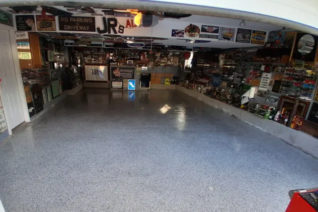 The same garage from the same spot, finished in gray flake with a gloss topcoat