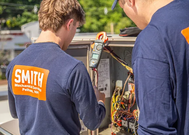 Technician reading diagnostic display
