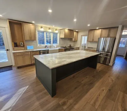 Quartzite kitchen island fabricated and installed by Precision Granite Works — New Hampshire