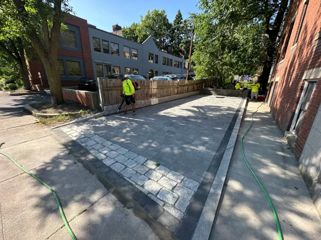 New paver driveway apron and walkway between two houses