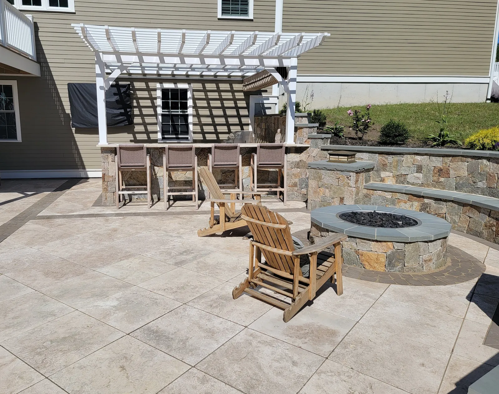 Custom stone patio built by Stiles and Sons in NH Seacoast
