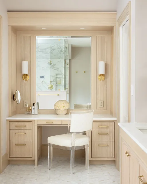 A vanity should feel as intentional as the rest of the home. Here, our custom cabinetry and millwork create a soft, elevated moment with warm natural tones, reeded detailing, and clean brass hardware, bringing craftsmanship and everyday function together beautifully.
Cabinetry: Fallon Fine Cabinetry
Interior Designer: @tastedesigninc 
Photographer: @emilyobrienphoto_design 
Architect: @slocumhalldesign 
#CustomVanity #BathroomDesign #LuxuryBathroom #CustomCabinetry #CustomMillwork #LuxuryMillwork #BathroomInspiration #LuxuryInteriors #CabinetryDesign #ArchitecturalMillwork #BespokeInteriors #InteriorDetails #FineWoodworking #LuxuryHomeDesign #PrimaryBathroom #VanityDesign #CustomHomes #CustomBuilder #MassachusettsBuilder #NewEnglandHomes