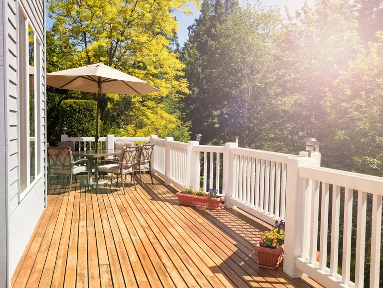 Custom cedar deck with outdoor furniture