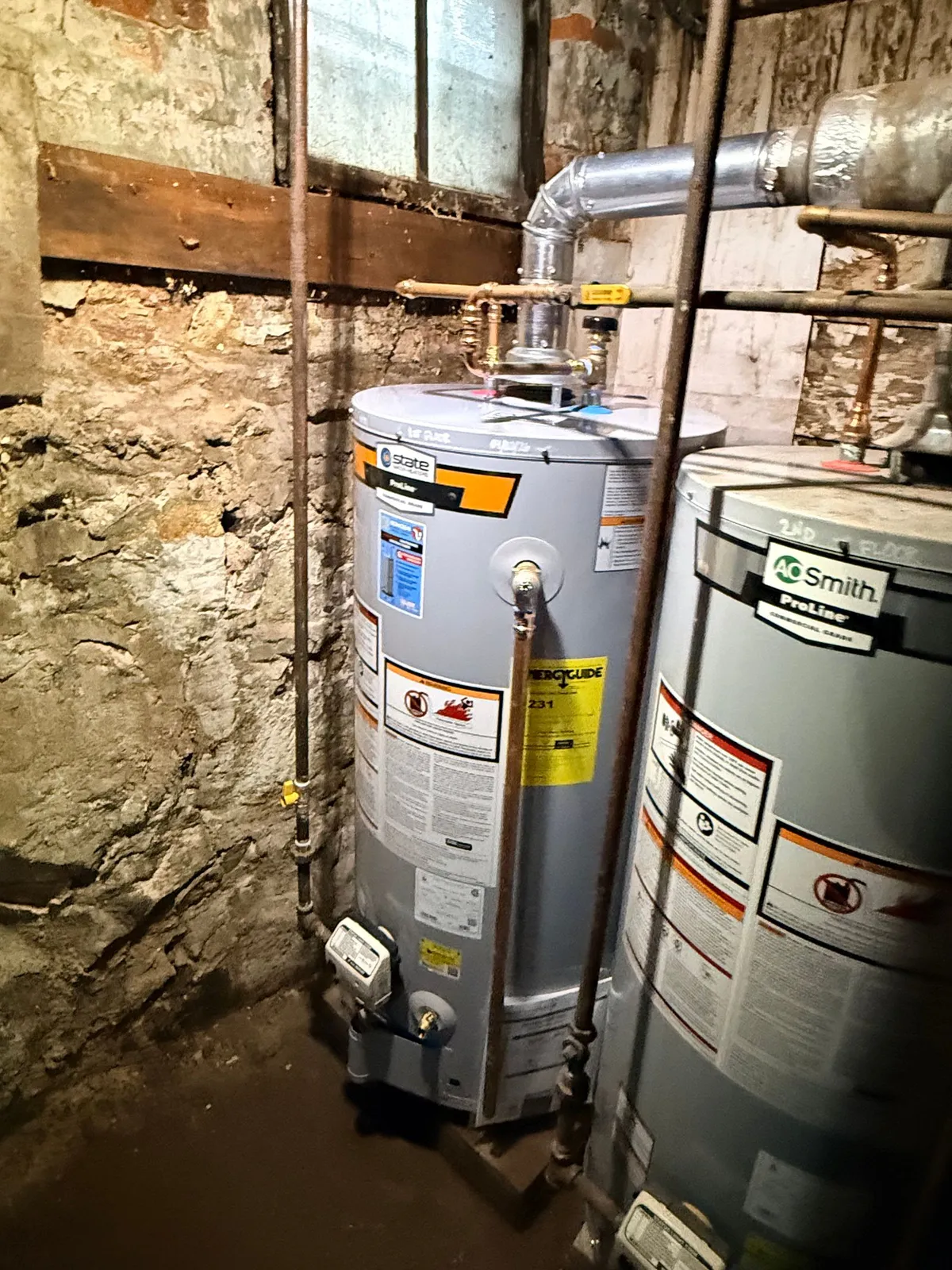 New gas water heater with flue and gas piping