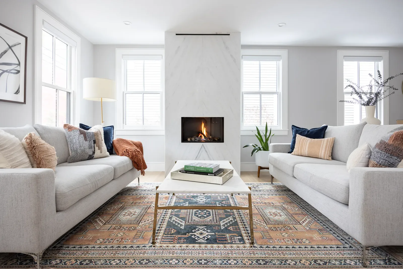 Living room with plaster fireplace surround