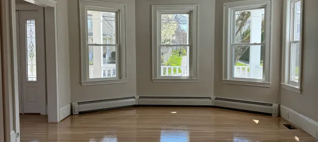 Residential floor refinishing Somerville MA - home hardwood floor sanding and staining with custom color finish and polyurethane coating