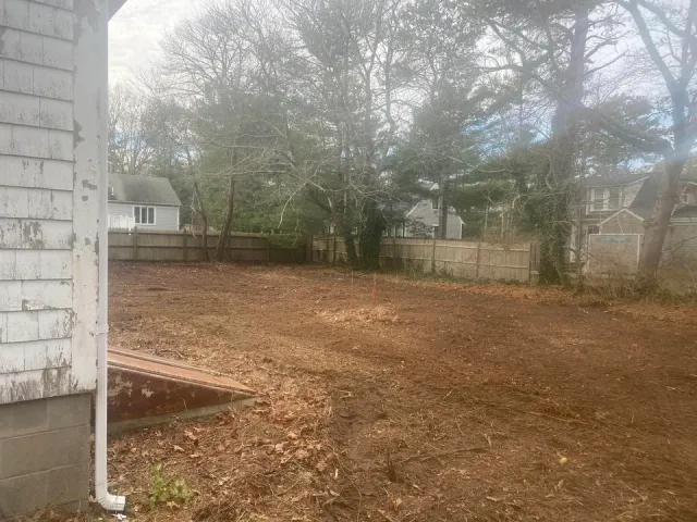 After backyard clearing by house