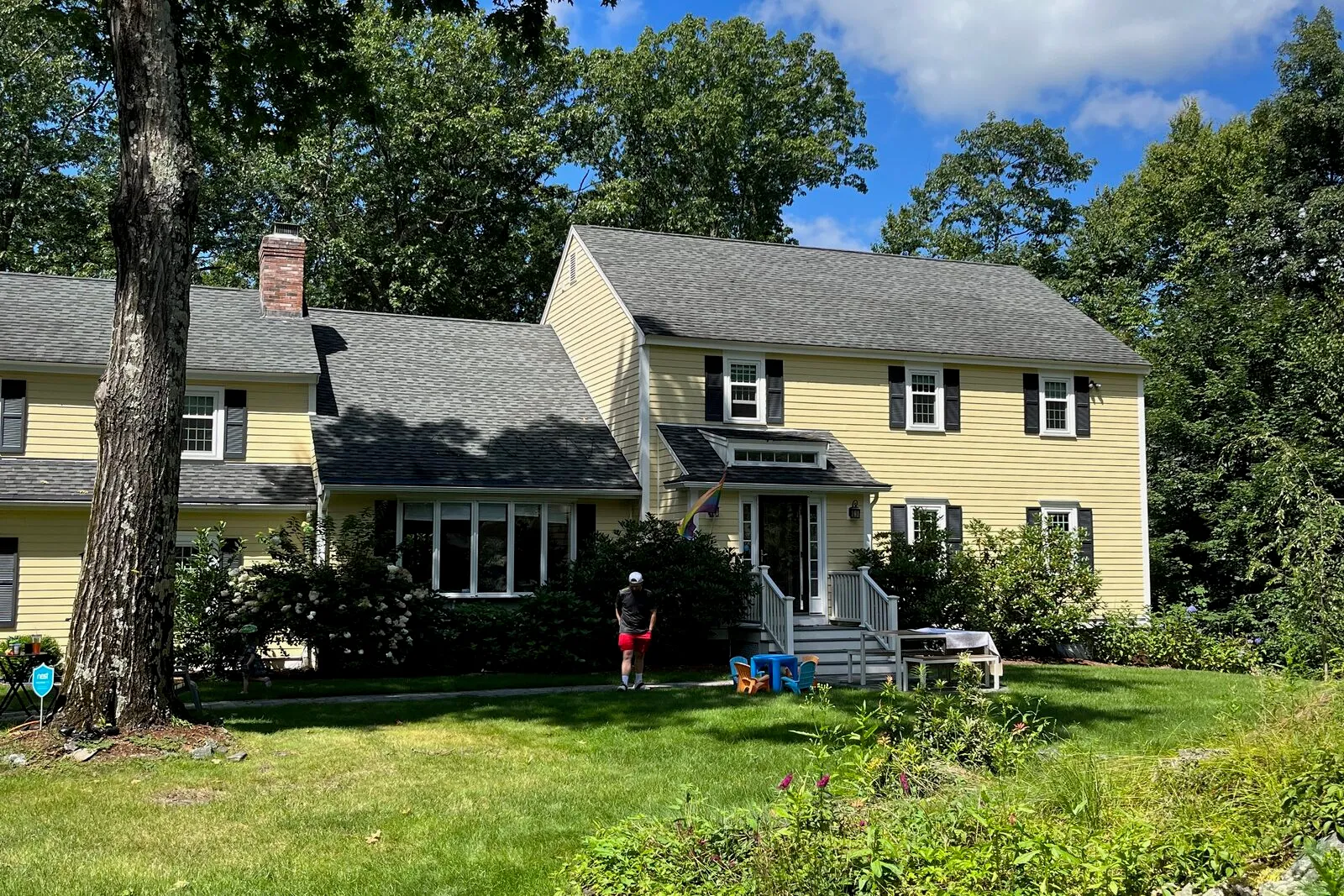 Roof replacement on a Sudbury residence with chimney and skylight flashing.