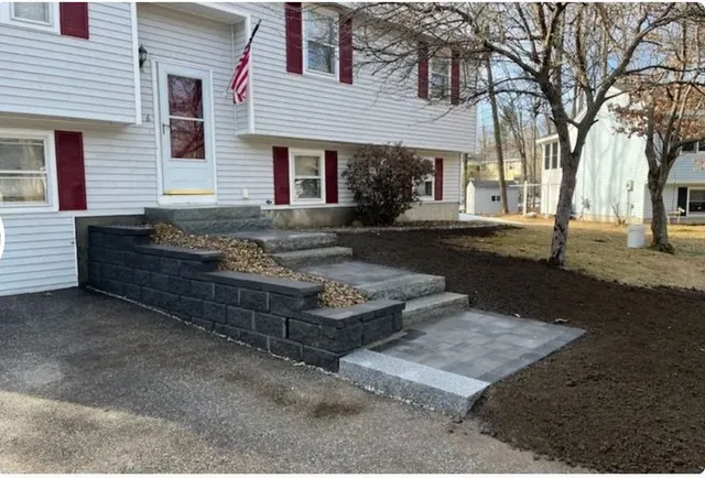 Front Walkway Transformation: Stunning Retaining Wall and Pathway by Martin's Landscaping & Construction