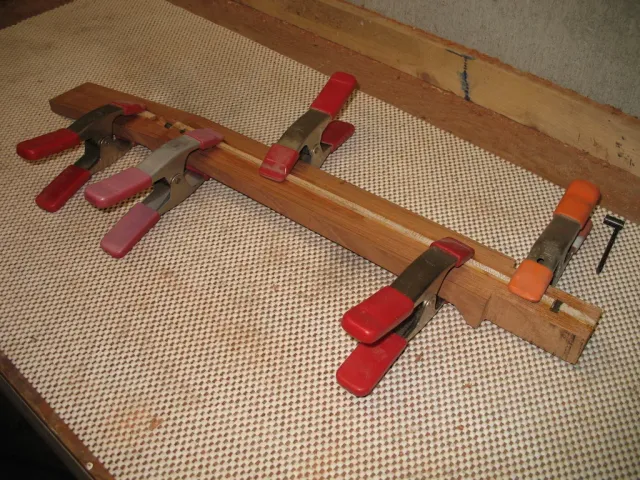Black walnut top pieces glued and clamped together