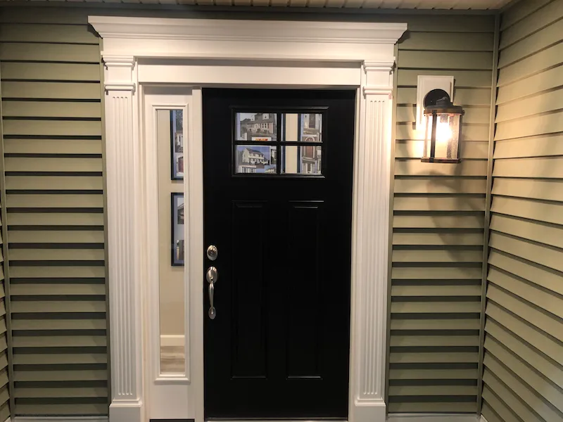 Hi-Tech Methuen showroom: entry door and lap siding display