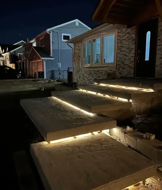 Enhance your home's beauty and security with our professional outdoor lighting solutions—perfectly designed to accentuate hardscaping features while providing functional illumination for pathways and entertaining areas all night long. for S&G Hardscaping and Plowing in Boston, MA