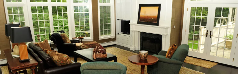 Living room with fireplace and french doors