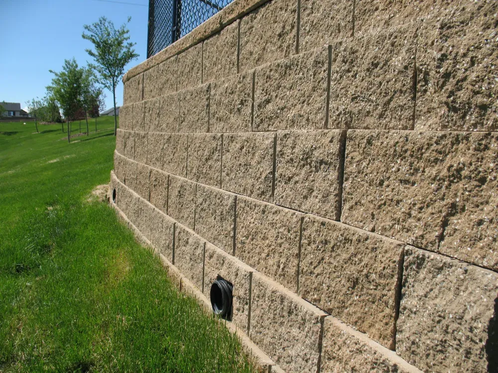 Enhance your outdoor space with our professional retaining wall installation service, designed to prevent soil erosion while adding beauty and structure, tailored specifically to complement your landscape's unique aesthetics. for S&G Hardscaping and Plowing in Boston, MA