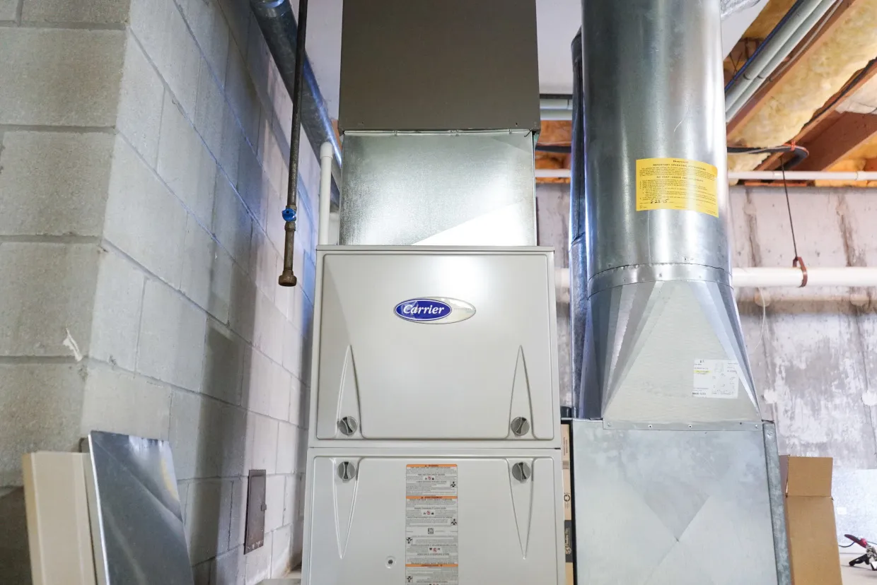 Carrier forced-air furnace installation for Cape Cod homeowners.