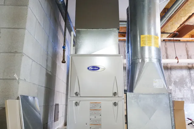 Carrier forced-air furnace installation for Cape Cod homeowners.