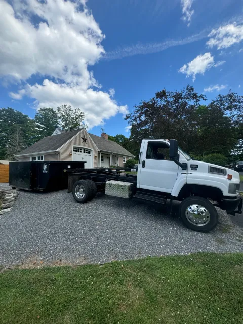 Residential dumpster rental setup in Connecticut for remodeling debris