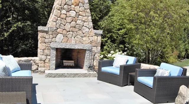 Outdoor stone fireplace and patio